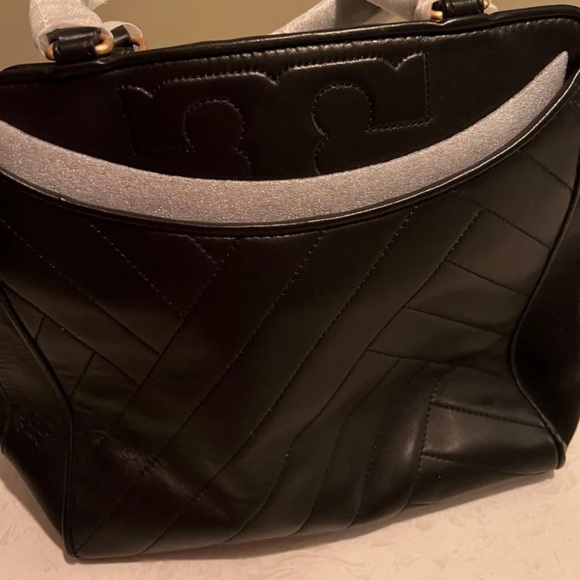Beautiful satchel! Brand new! Leather is super soft. - Picture 3 of 5